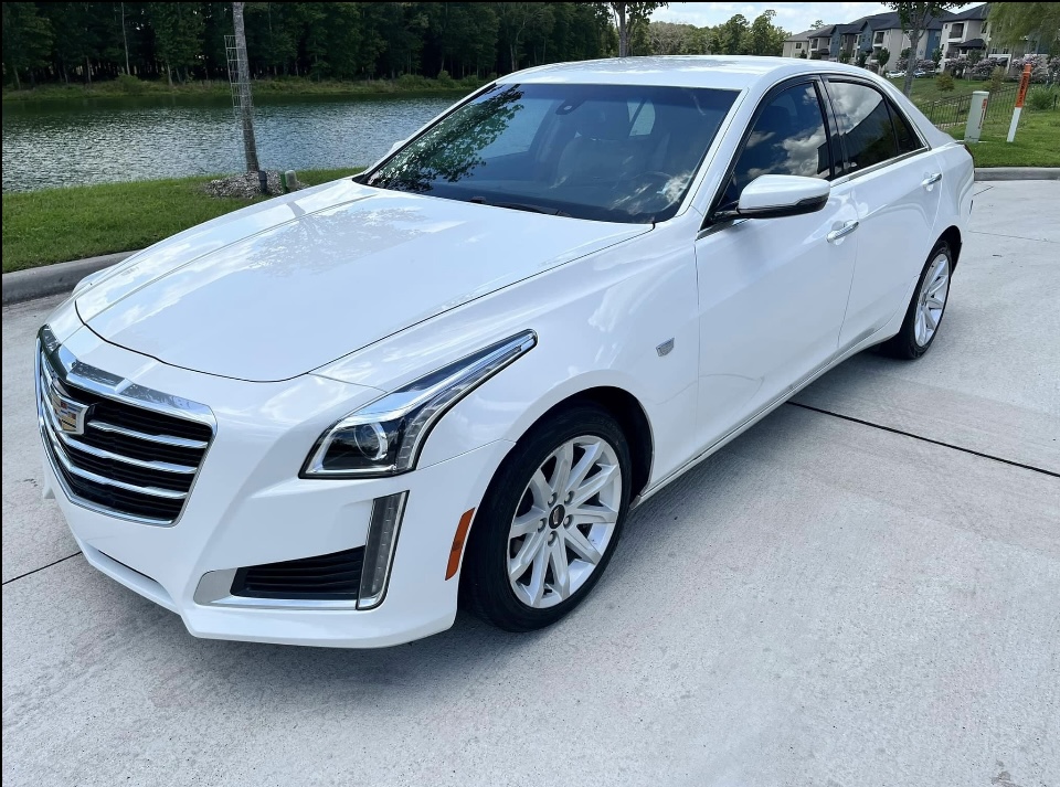 2015 Cadillac CTS, white exterior, front driver-side view